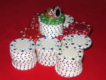 Stacked poker chips on a table representing a big tournament payout